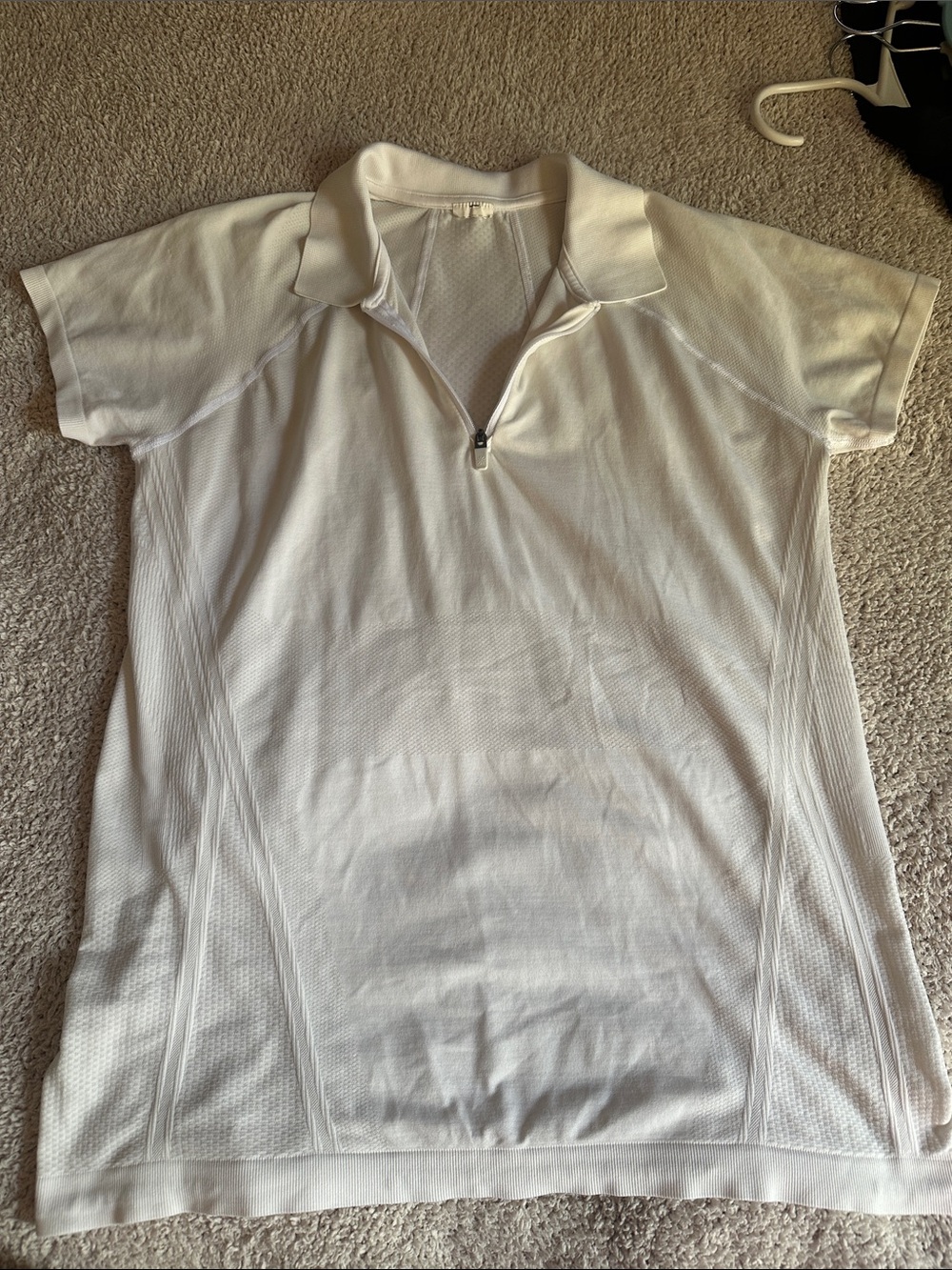 Athleta white zip up polo. Size medium, 17’ ptp. EUC